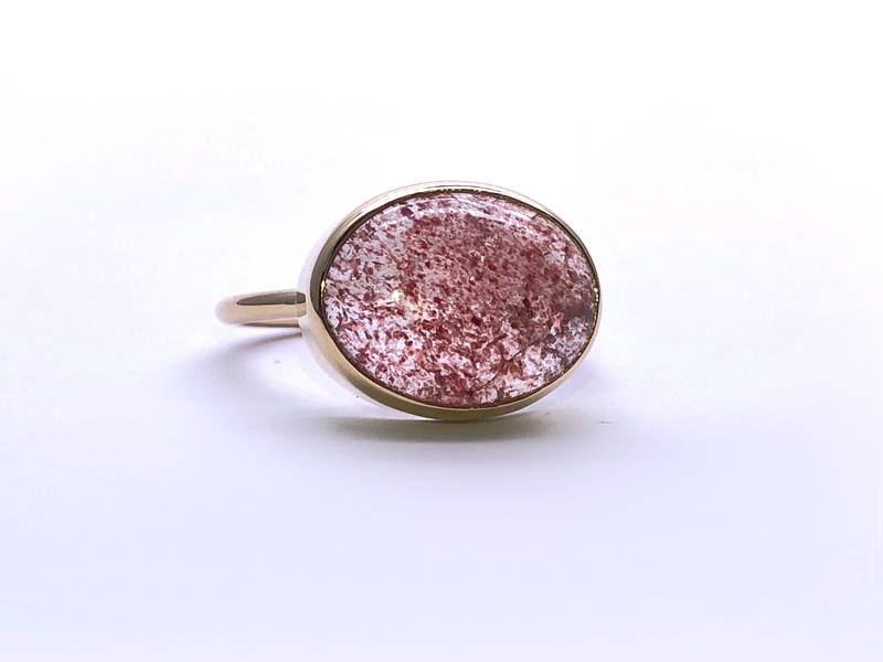 fine ring with big red and cream quartz stone