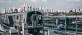 New York City skyline and MTA subway train