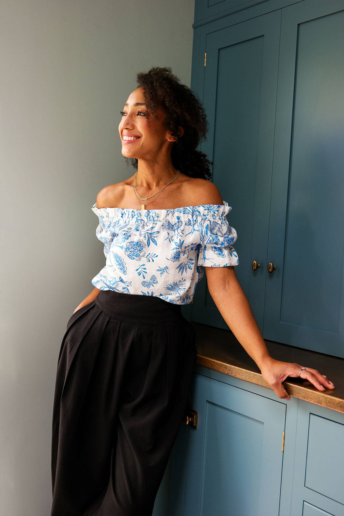 Nikki Tibbles wears Yolke's bluebird print Lila Blouse