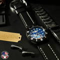 Watch customization assembly snapshot. DLC-black 42mm Classic case with blue dial featuring USAF Command Pilot Wings and a jet top-view with ENJJPT logo.