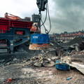 a crane lifting a bucket