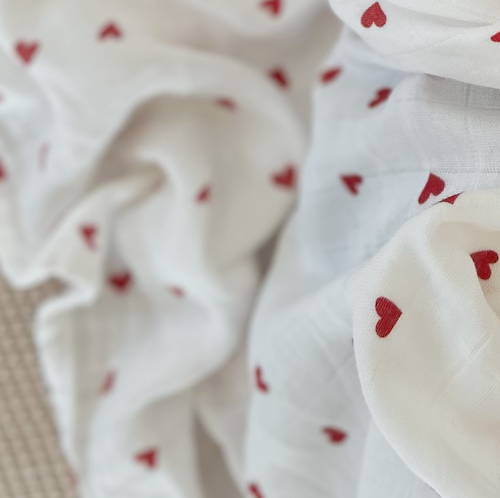 Lange XL et mini élégant de la marque suisse Joli Nous, un accessoire premium pour bébé, alliant design raffiné et qualité exceptionnelle OEKO-TEX GOTS