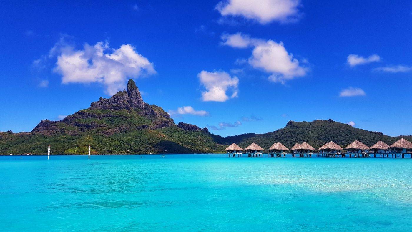 Bambina Bora Bora Travel Guide French Polynesia overwater bungalows overlooking Mount Otemanu