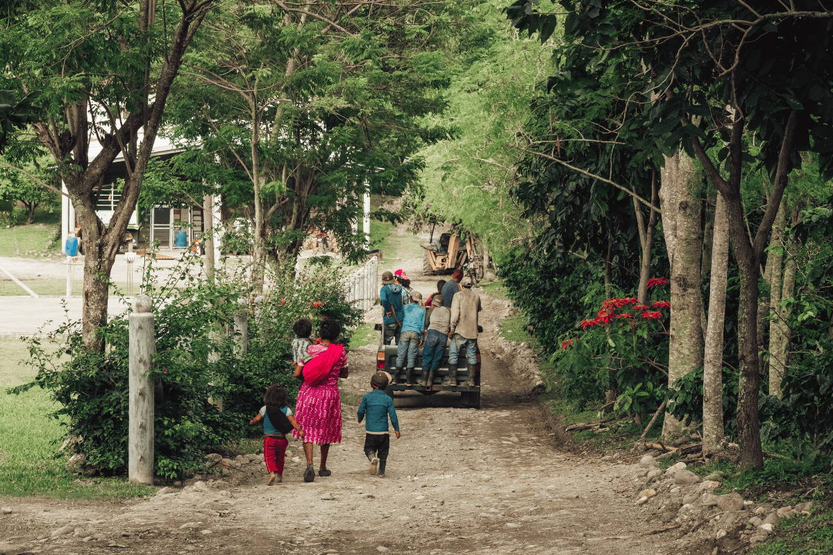 Coffee Farmers walking down road. 