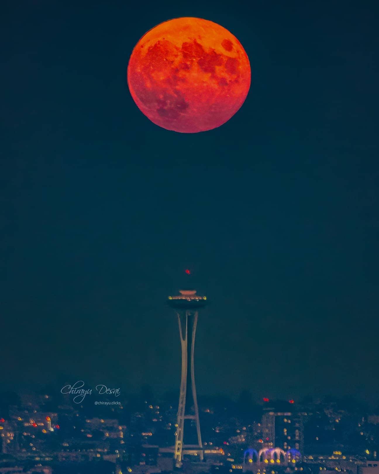 Cura Moon Notes. Spooky Aries Hunter Full Moon Seattle October 2022 Space Needle wildfires smokey sky by Chirayu Desai