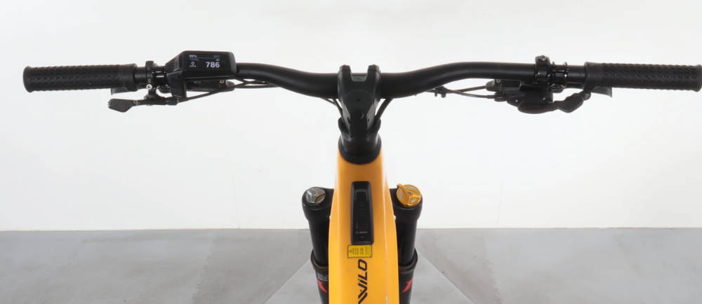 the handlebars on a Orbea Wild full suspension electric mountain bike