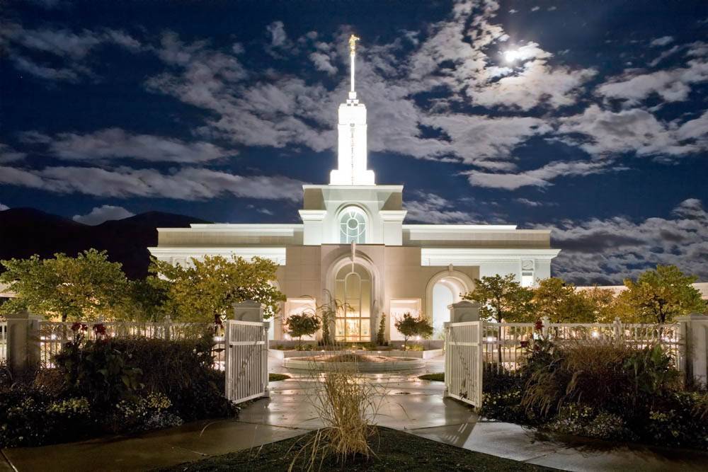 LDS art photo of the Mount Timpanogos Temple shining in the moonlight. 