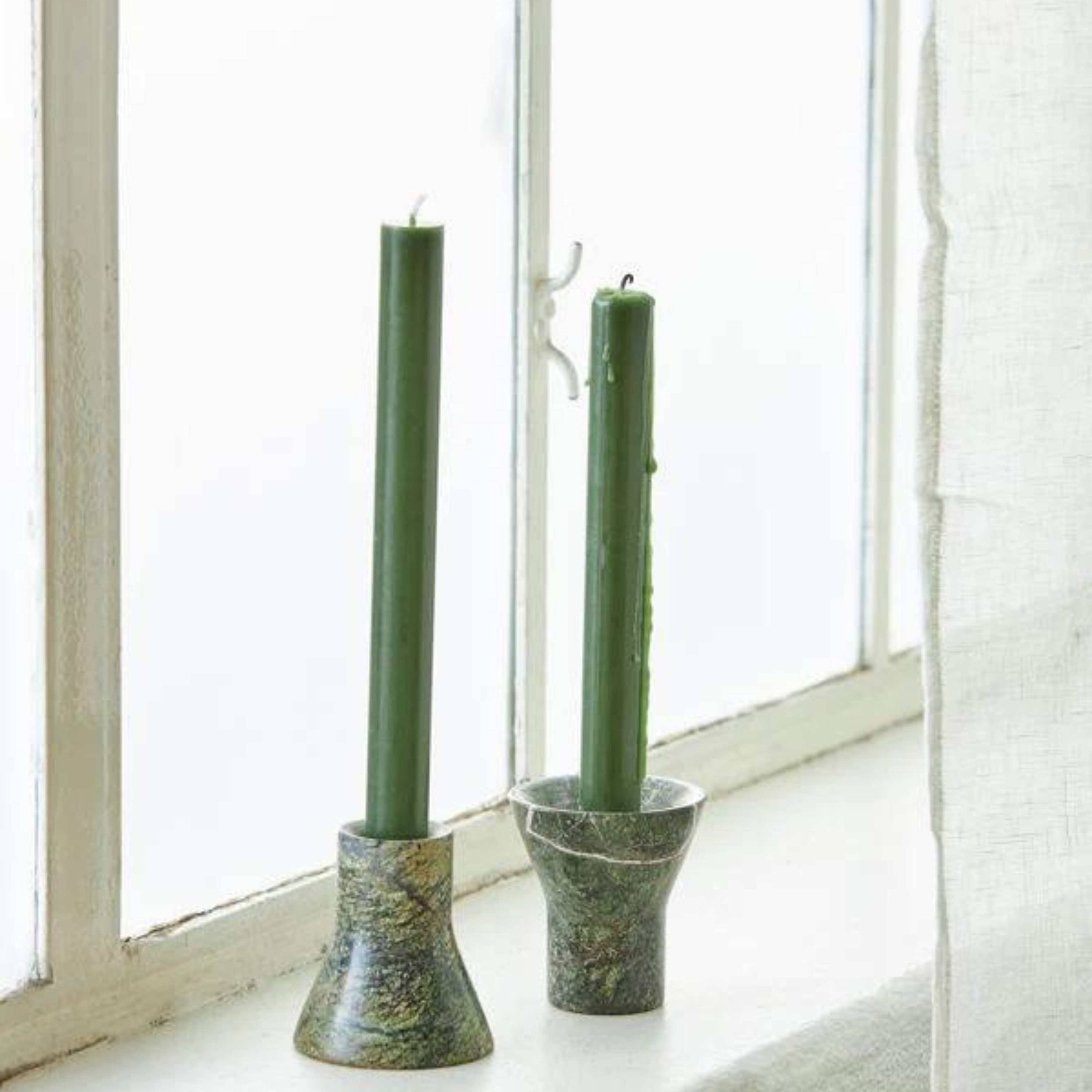 Flare Candle Holder Forest Green by Città - a green marbled candle holder with a green tall candle.