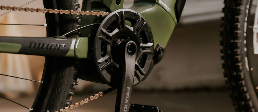 a green Niner Rip e9 full suspension electric mountain bike