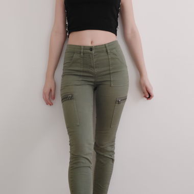 Dark green pants with pockets and zippers
