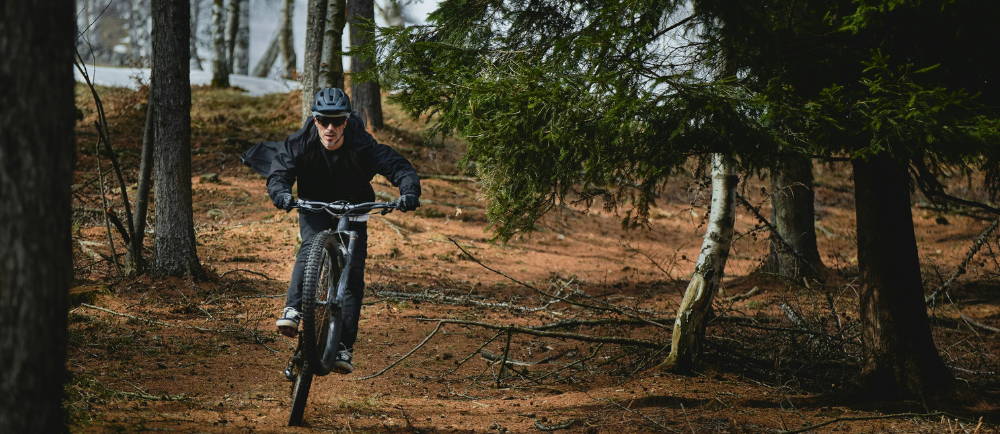 a man riding an electric mountain bike