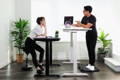 MotionGrey Standing Desk Set at Different Heights