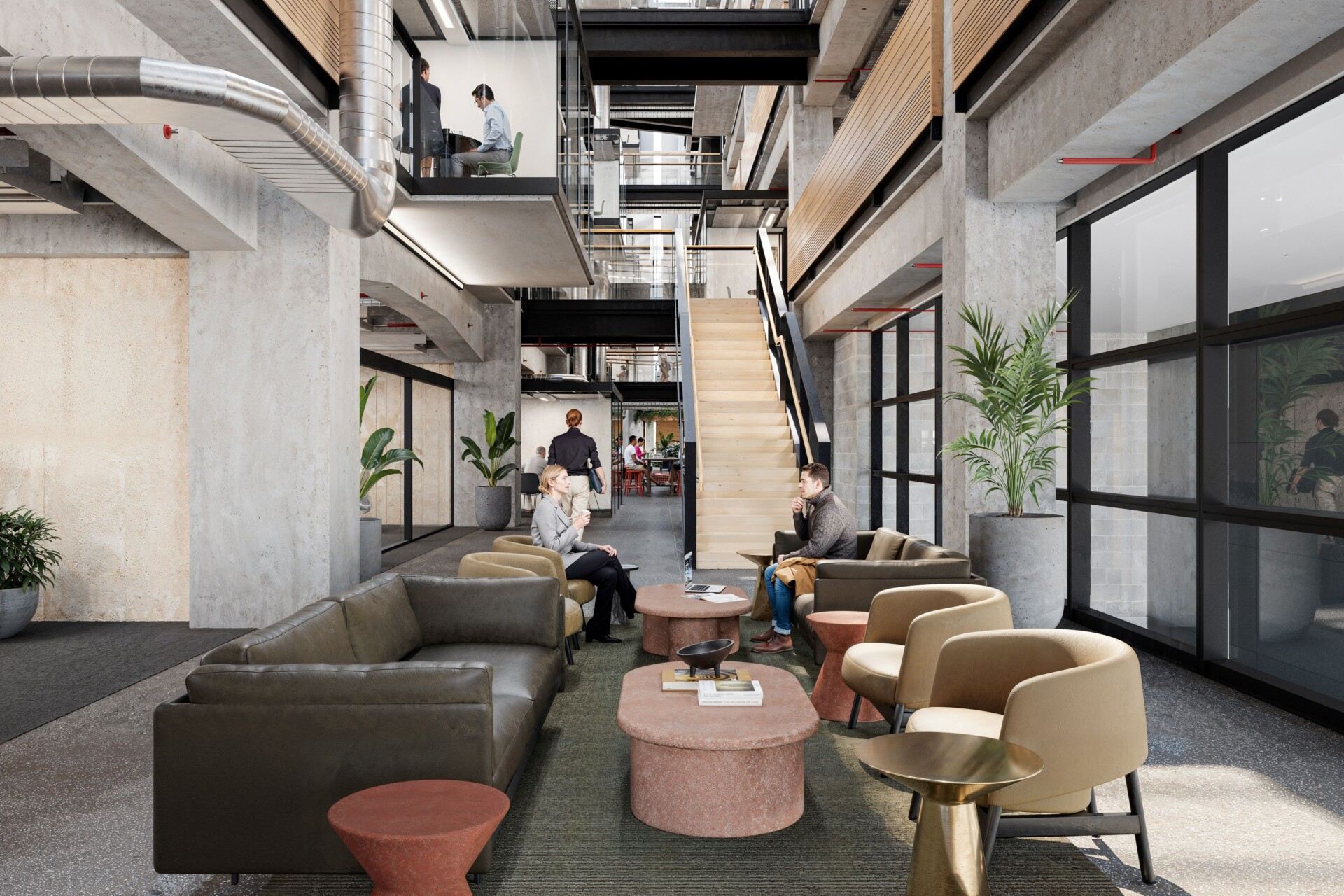 Modern office space with industrial design, featuring people sitting on sofas and chairs around coffee tables, a central staircase, large windows, indoor plants, and open work areas on upper and lower levels.