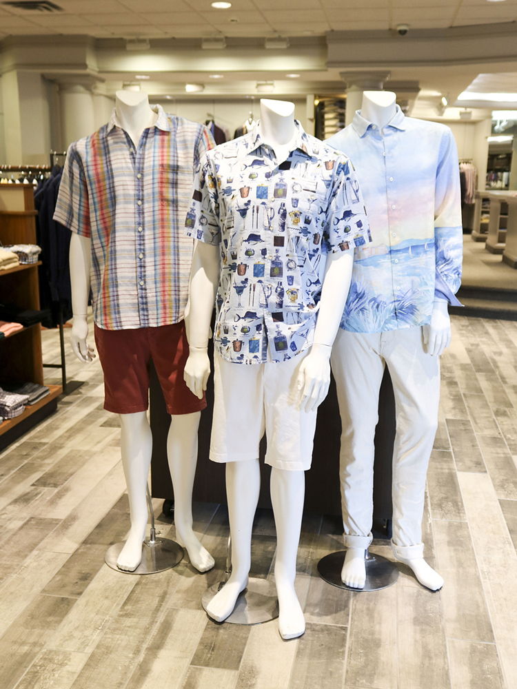 Mannequins wearing casual menswear in the Lee Newman showroom