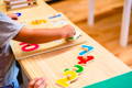 Kids playing with math Montessori toys and learning how to count