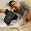 Man wearing Checkme O2 Max wrist oxygen monitor with ring sensor during overnight oxygen monitoring