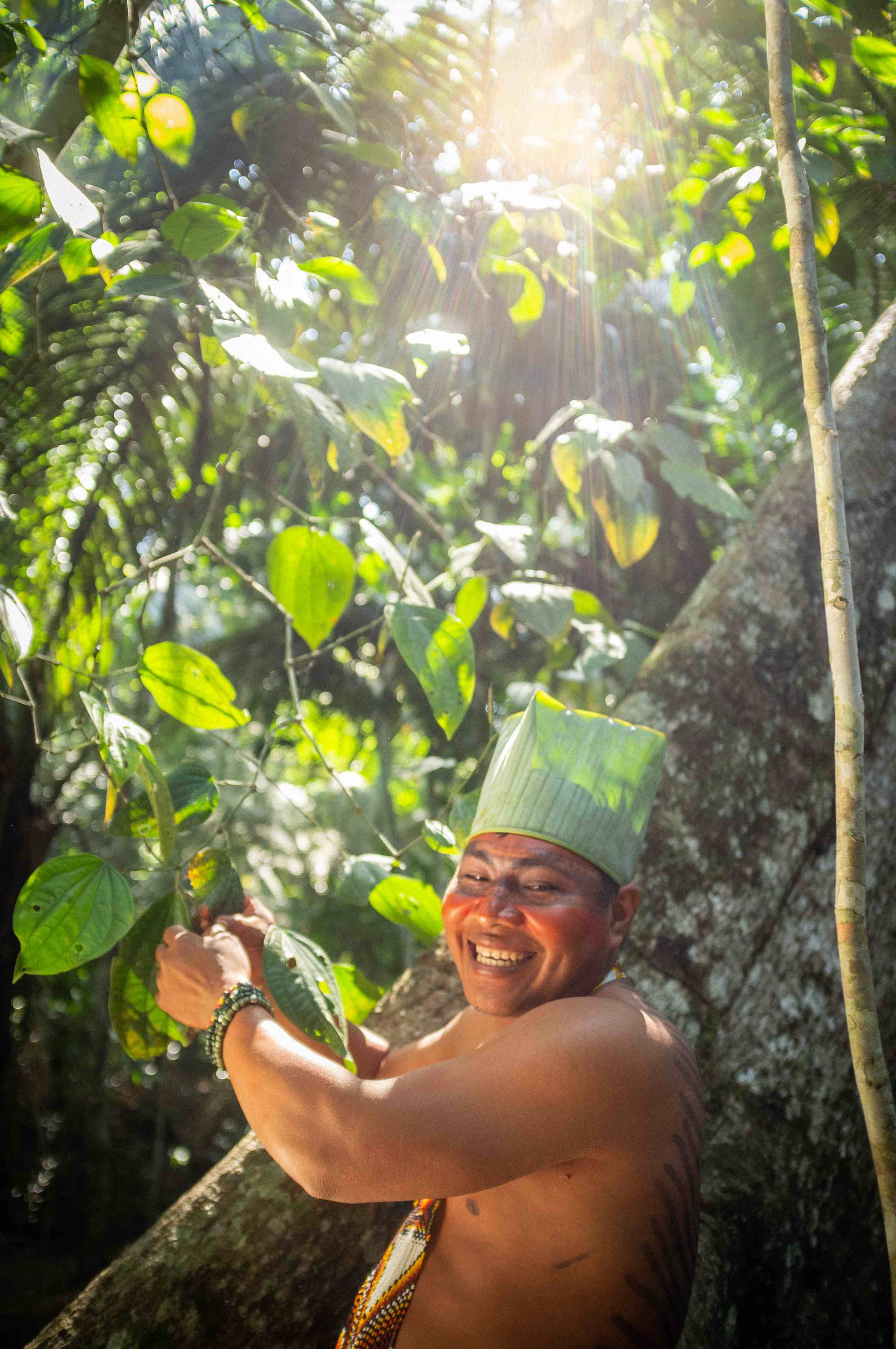 Yawanawá community member in the rainforest