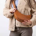 female-wearing-cross-body-purse