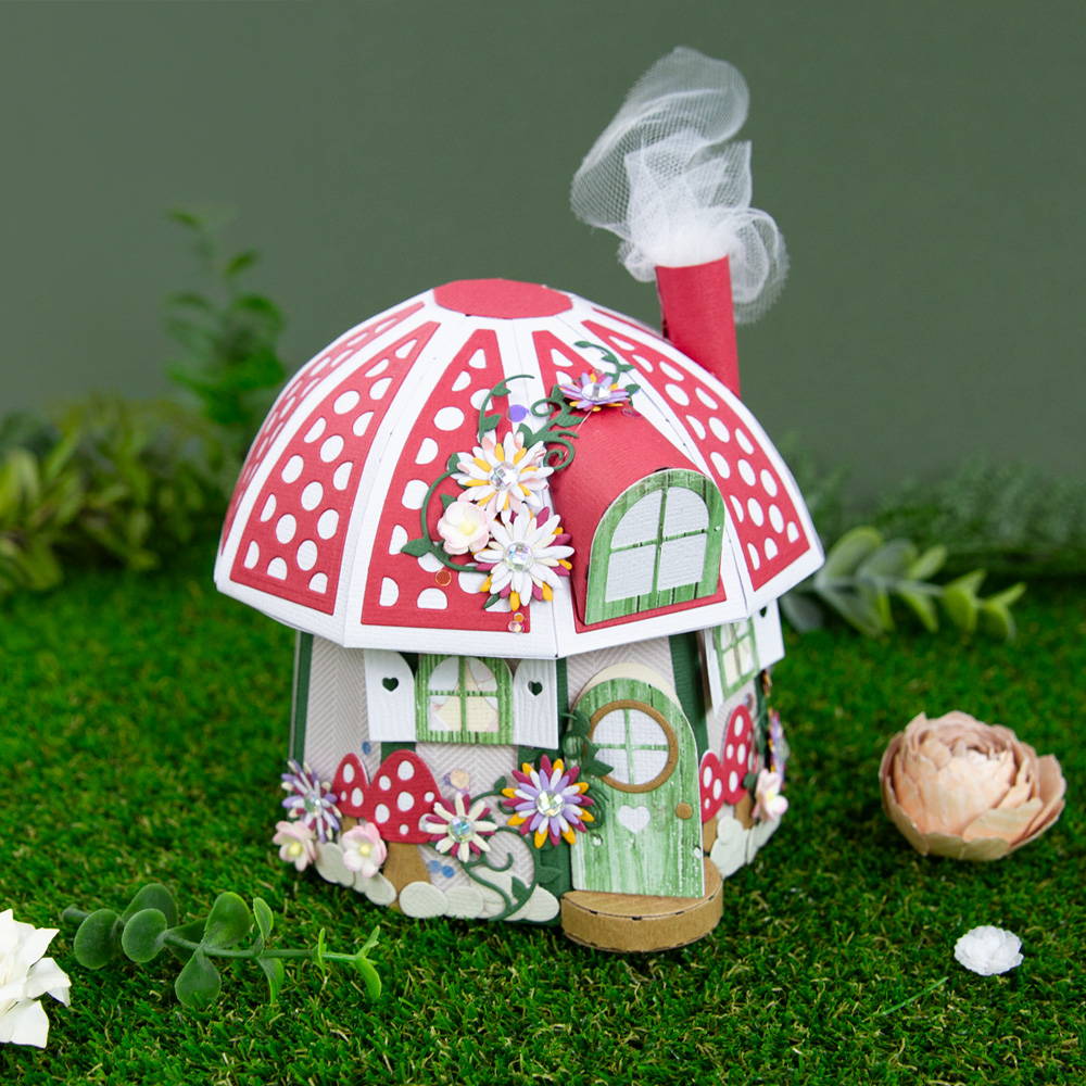 Paper crafted toadstool fairy house