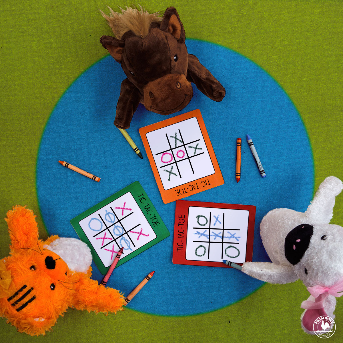 Primrose puppets Peanut the pony, Katie the cat and Libby the lamb play tic-tac-toe