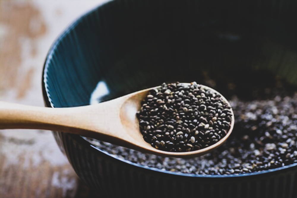 Chia seeds in wooden spoon