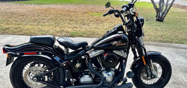 2009 HARLEY-DAVIDSON FLSTSB SOFTAIL CROSS BONES (BLACK) motorcycle for rent near Garden Ridge, TX