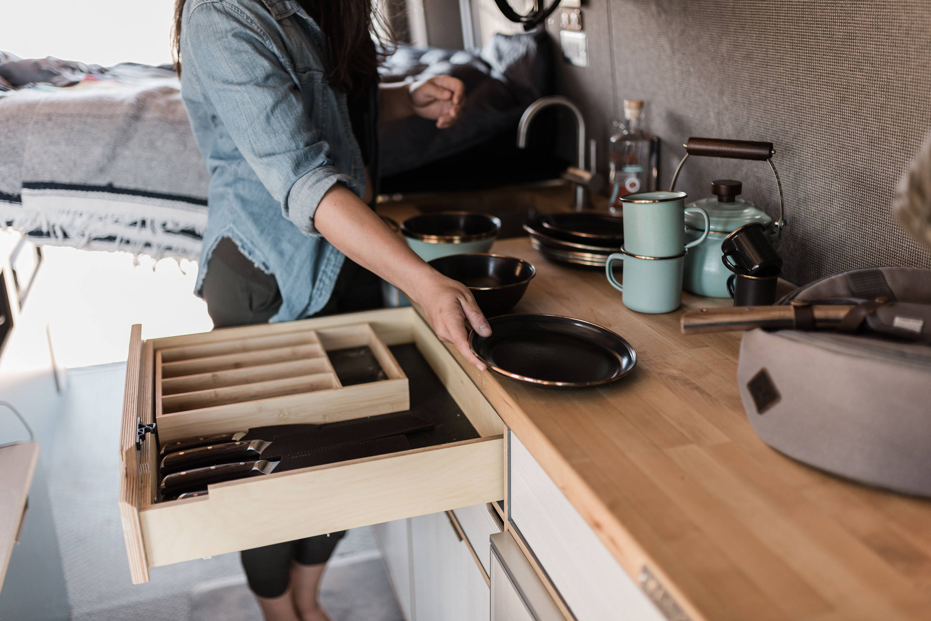 Rack & Roll - Sprinter 144 Camper Van Conversion - Kitchen with Refrigerator and Drawers - The Vansmith