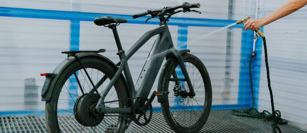 Washing hybrid electric bike with hose