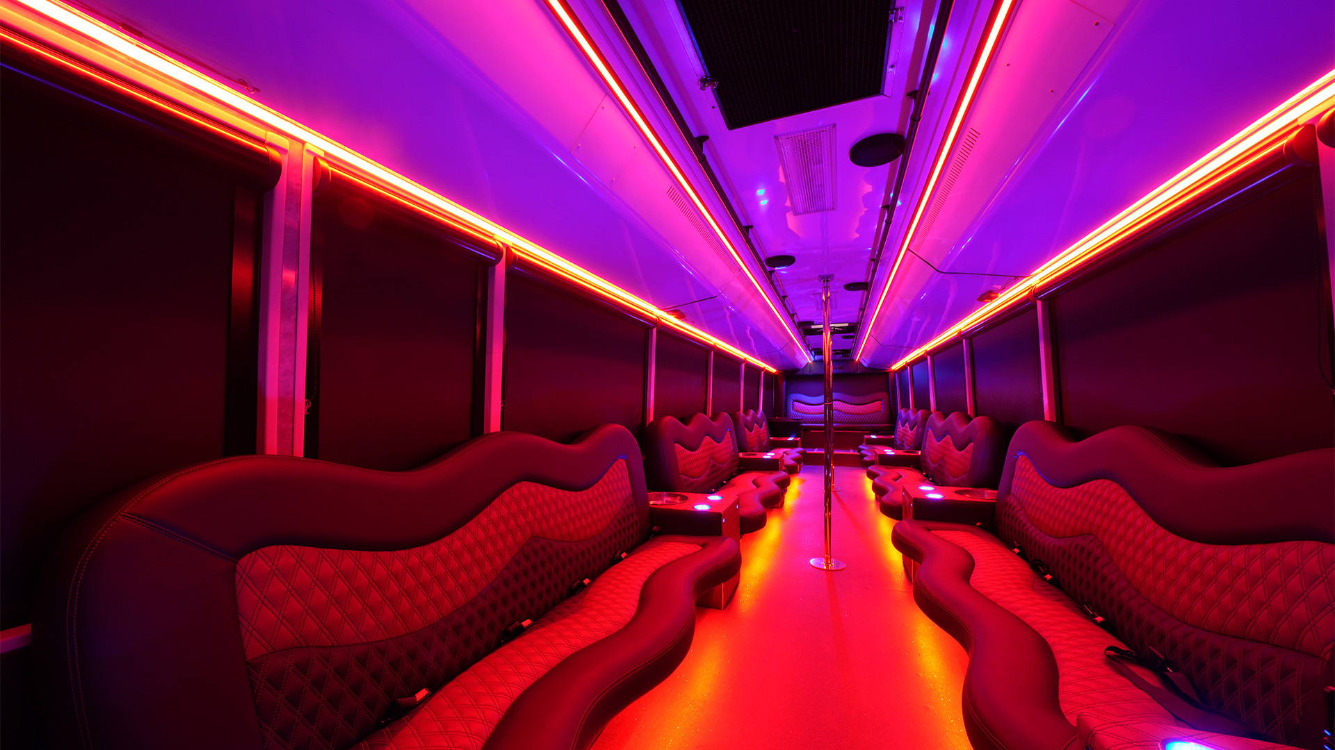 Havit Commercial 120LED RGB IP20 Chasing LED Strip interior in purple / pink, warm colours radiating throughout the interior of the bus