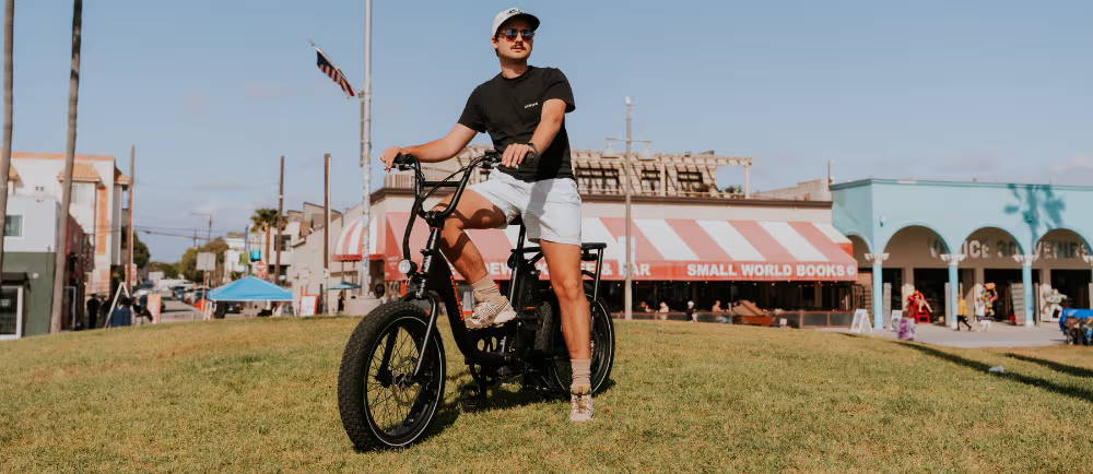 Rider on Rad Power electric bike at boardwalk