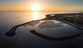 Port de Noirmoutier vu du haut avec la mer et le soleil au coucher