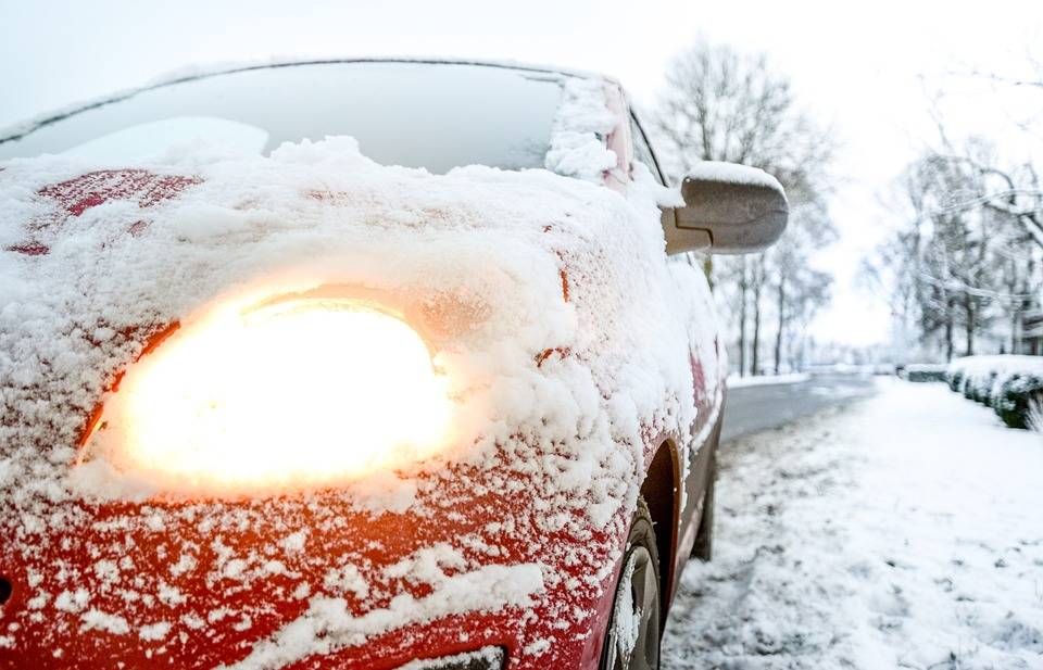 snow-covered-car-light