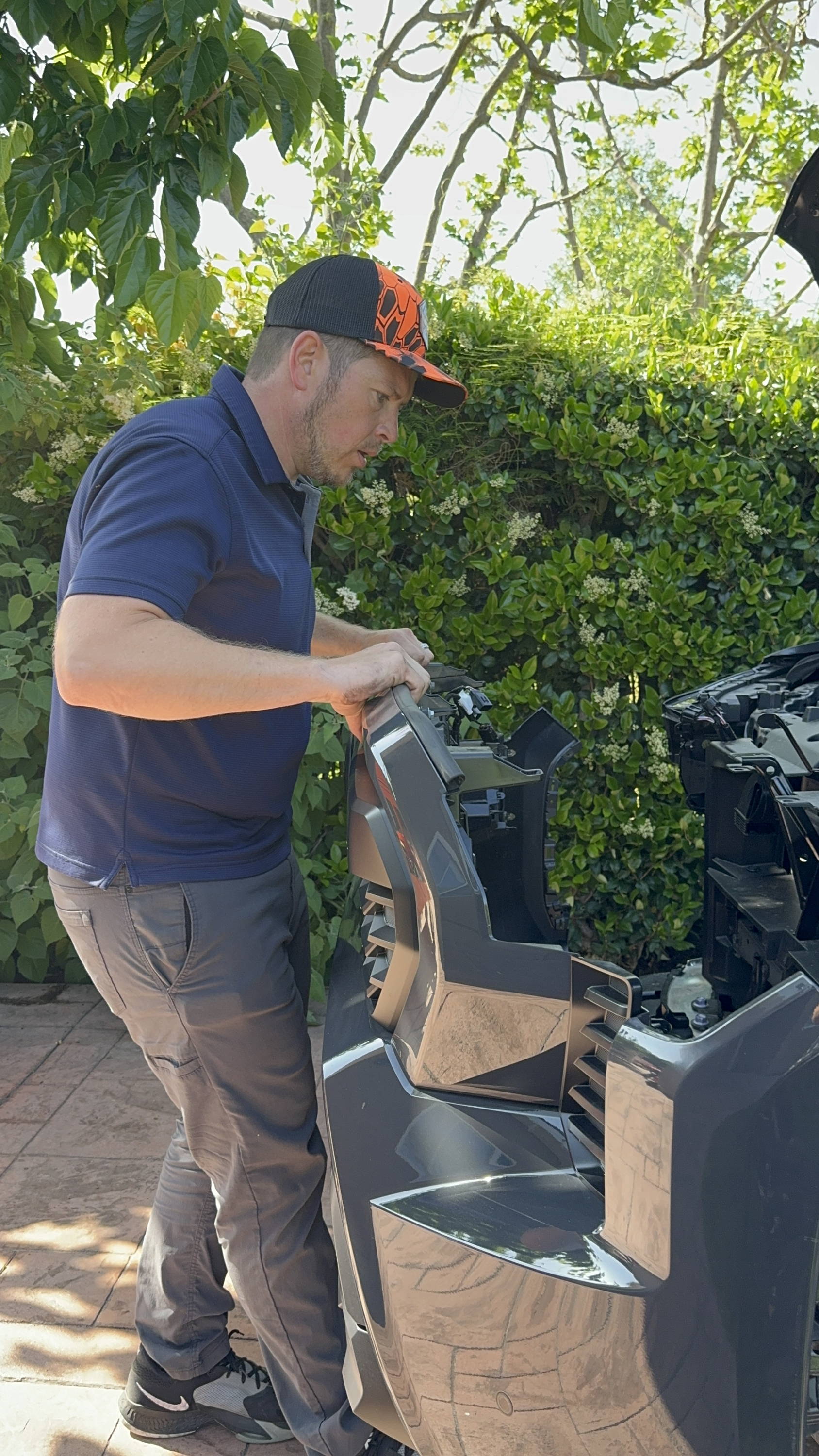 mike owner of m&R automotive removed grille and bumper from toyota tacoma