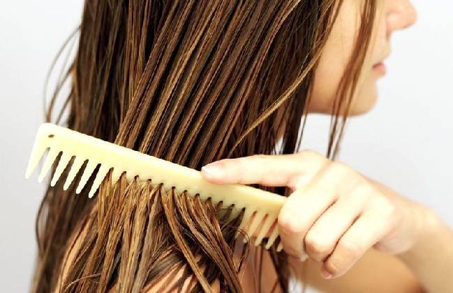 girl combing head photo gva hair