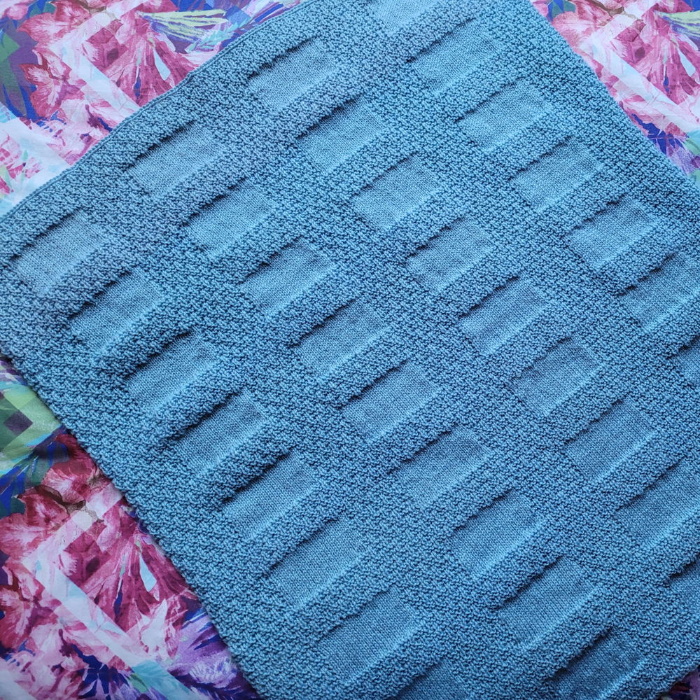 Texture and squares baby cot cover  using 8 ply yarn