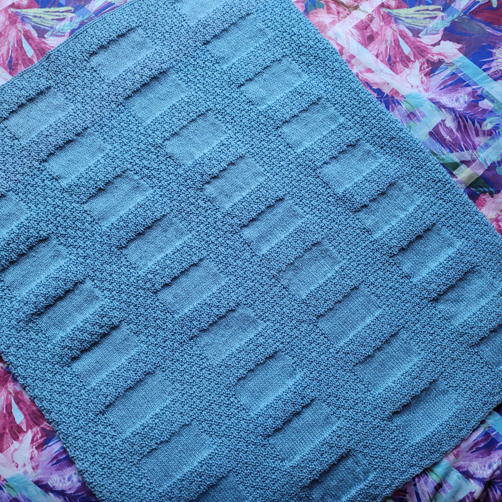 Texture and squares baby cot cover  using 8 ply yarn