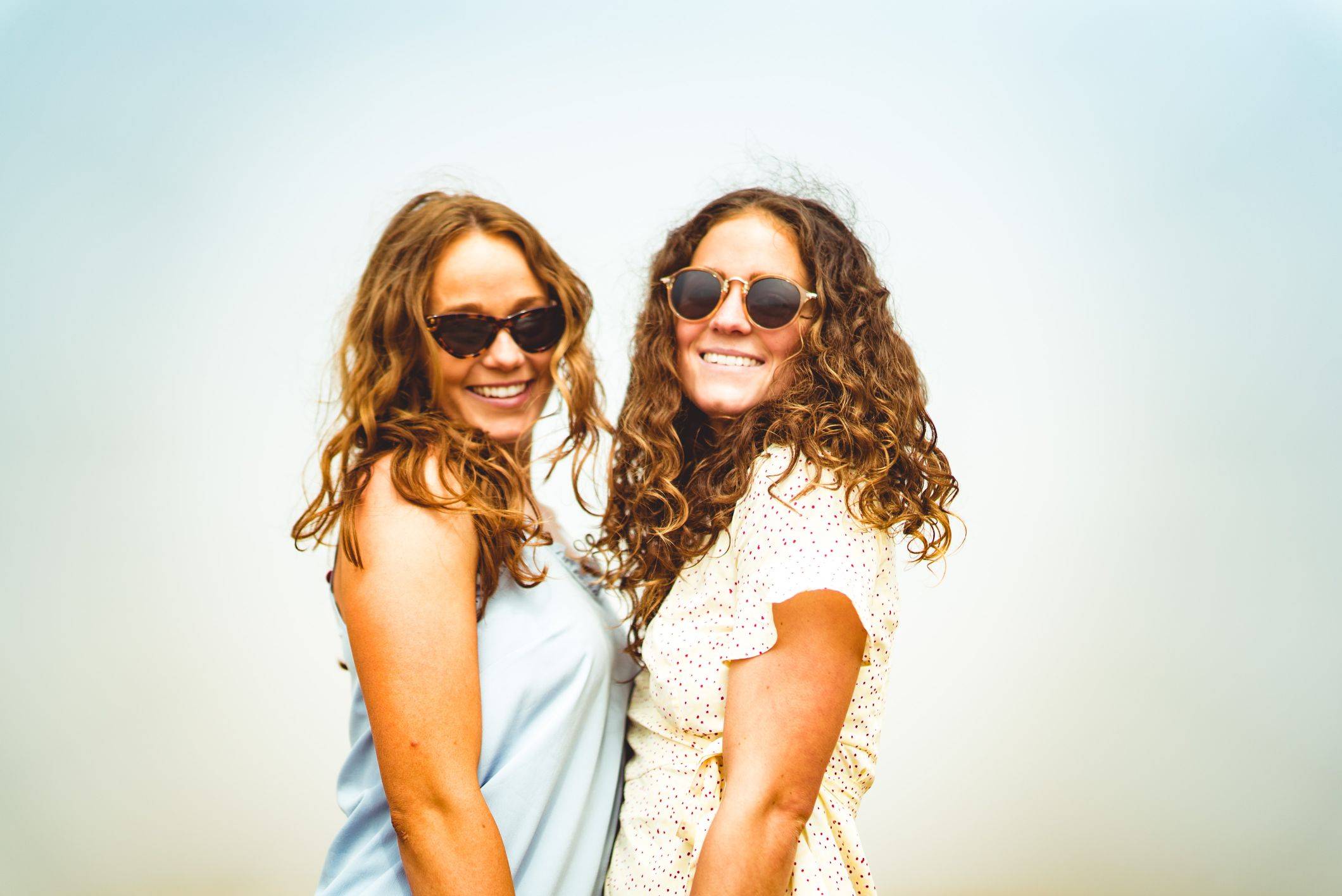 Image of a two women with curly and wavy hair