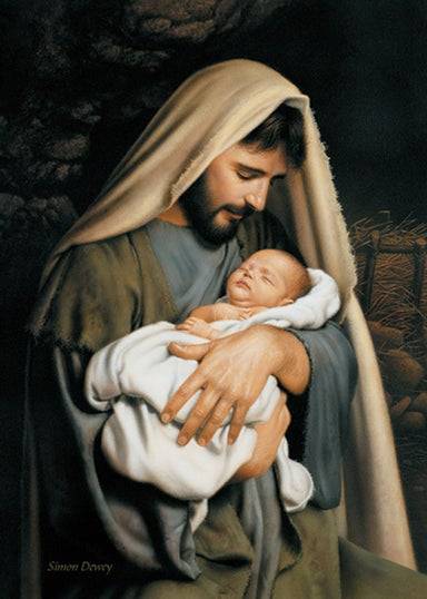 Joseph holding baby Jesus close.