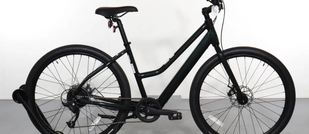 a black Cannondale Treadwell Neo 2 Remixte electric city bike
