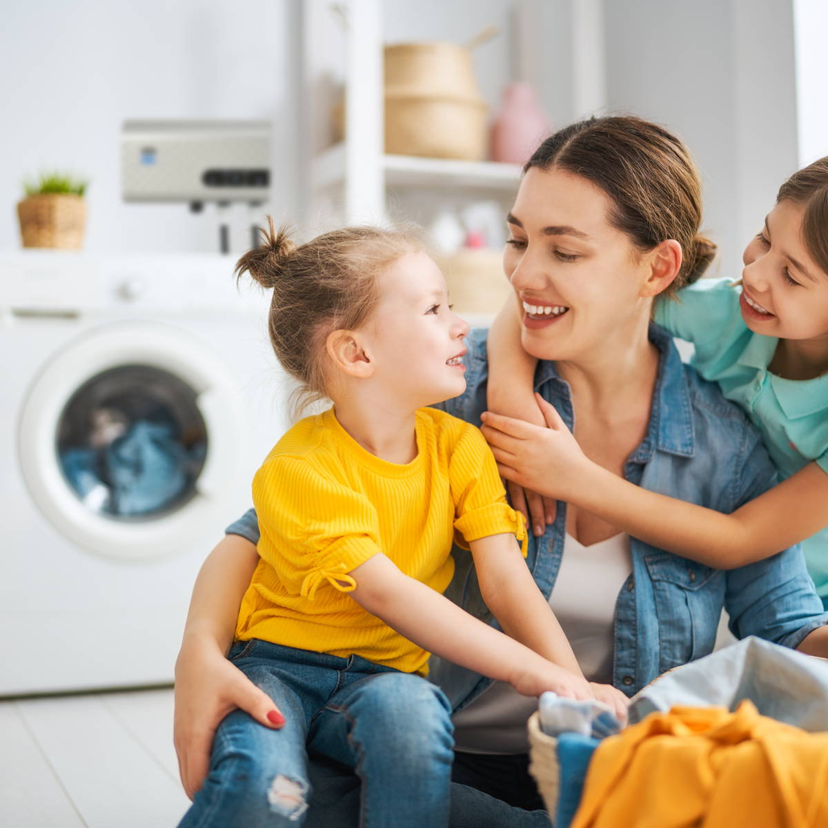 White EdenPURE UV IcePRO countertop ice maker producing fresh, clean bullet ice.