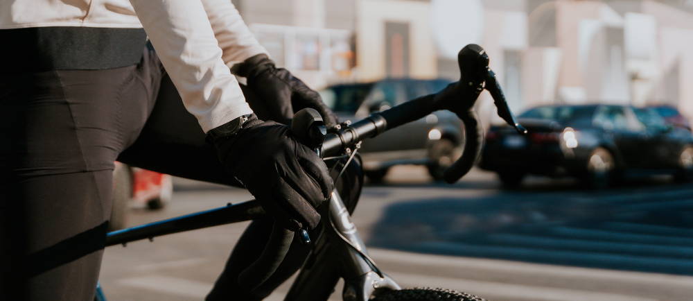 a man riding a Topstone Neo electric road bike in the city