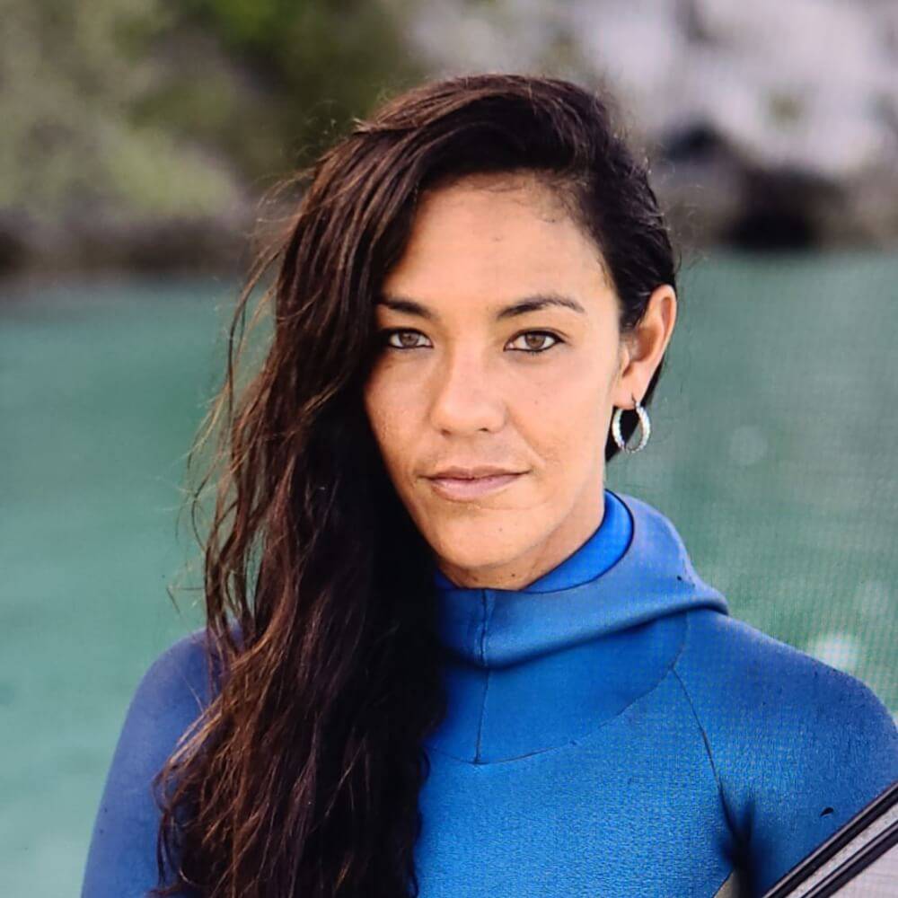 Enchante in a blue wet suit