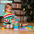 Child playing with blocks | The Milky Box