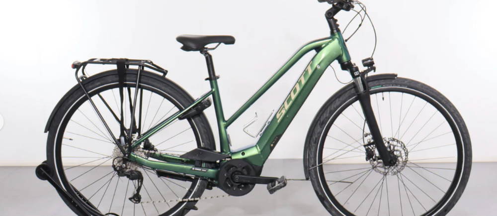 a green Scott Sub Active eRide 10 electric city bike