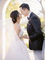 Bride and Groom Touching Noses Taken by Caroline Tran