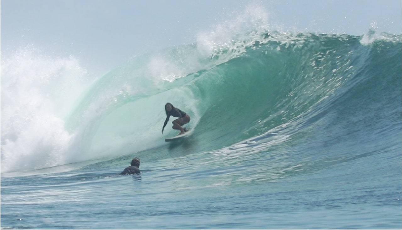 Delia Bense-Kang catching a wave!