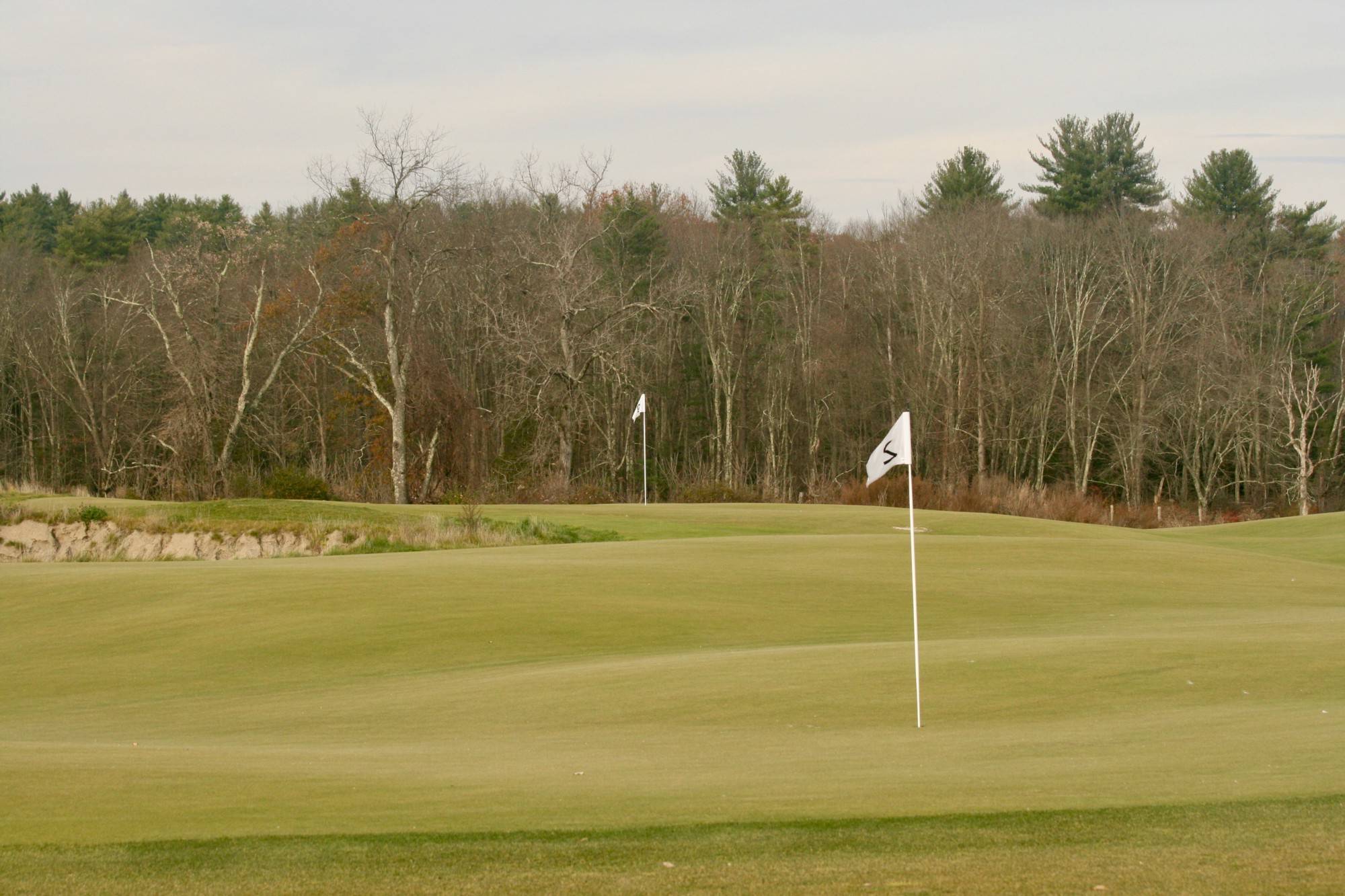 Two examples of double greens at Inness: the aforementioned third green, with the sixth green connected to it well below (top); and the visually striking second and ninth greens (bottom). Just look at those slopes.