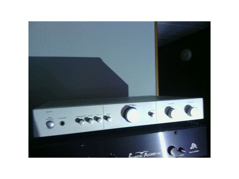 Rotel RA 02 silver integrated  amplifier with MM phono stage.