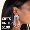 Model in earrings under $100