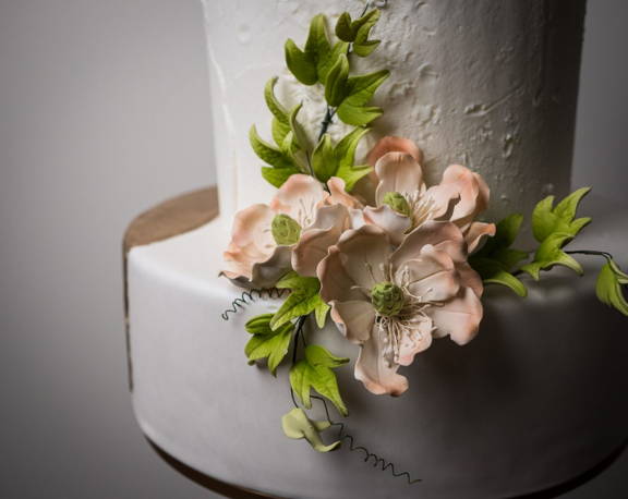 Beautiful wedding cake floral details created with love by the design team at House of Clarendon in Lancaster, PA